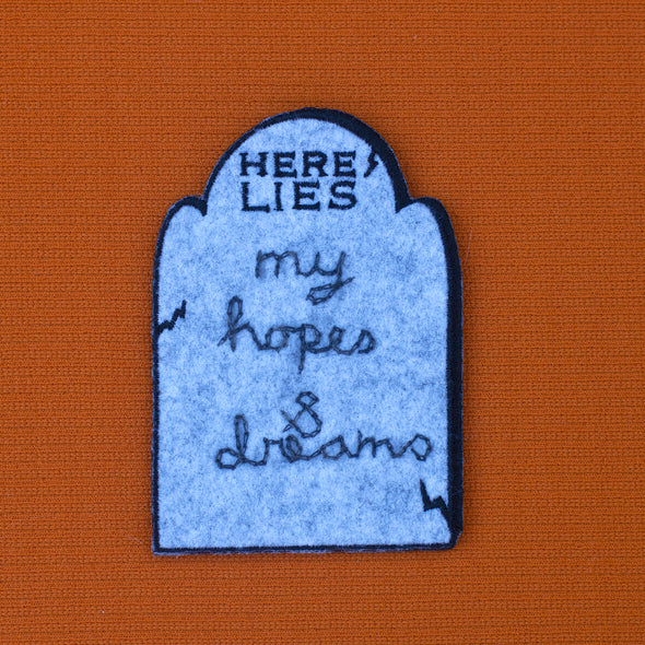 HERE LIES headstone patch with custom chain stitching.