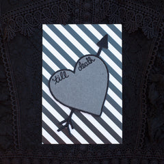 'till death heart patch with custom chain stitching.